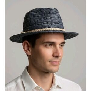 This is an Excellent Used Condition (EUC) stylish Kooringa fedora-style sun hat.